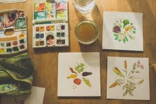 Ashley's art, find pen and watercolor pieces features in Homeward Bounty Seed packets.